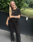 Transparente Hose in Schwarz