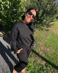 Pullover mit floraler Spitze an den Ärmeln in Schwarz