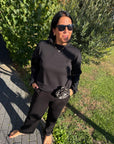 Pullover mit floraler Spitze an den Ärmeln in Schwarz