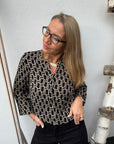 Edle Bluse mit V-Ausschnitt & geometrischem Print