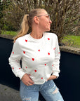 Herzchen-Pullover in Weiß