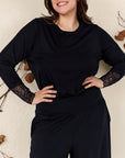 Langarmshirt mit Spitzenbündchen in Schwarz