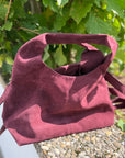 schicke Taschen in verschiedenen Formen in Bordeaux