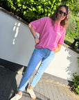 helle Jeans mit schicker Knopfleiste