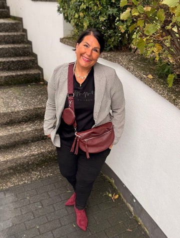 Joggpants mit Glitzerbändel in schwarz