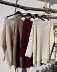 Grobstrickpullover mit engen Ärmeln