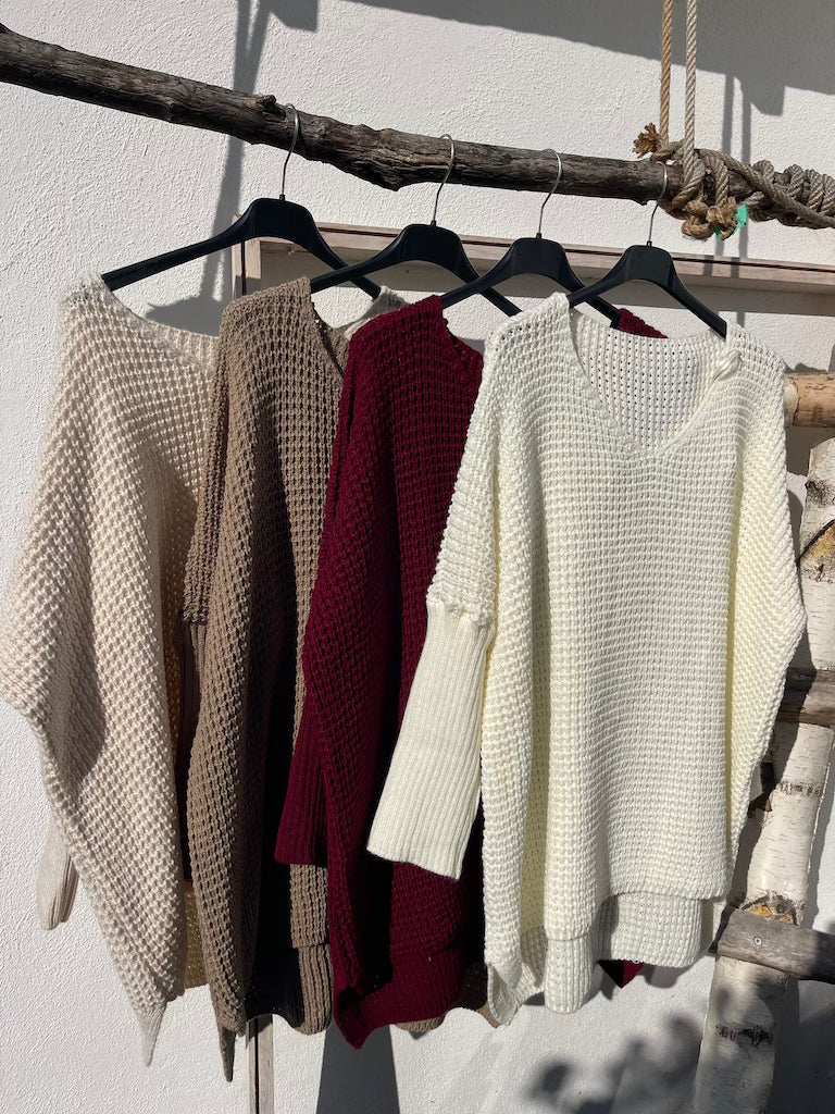 Grobstrickpullover mit engen Ärmeln