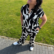 feine Stoffhose mit Muster in Schwarz
