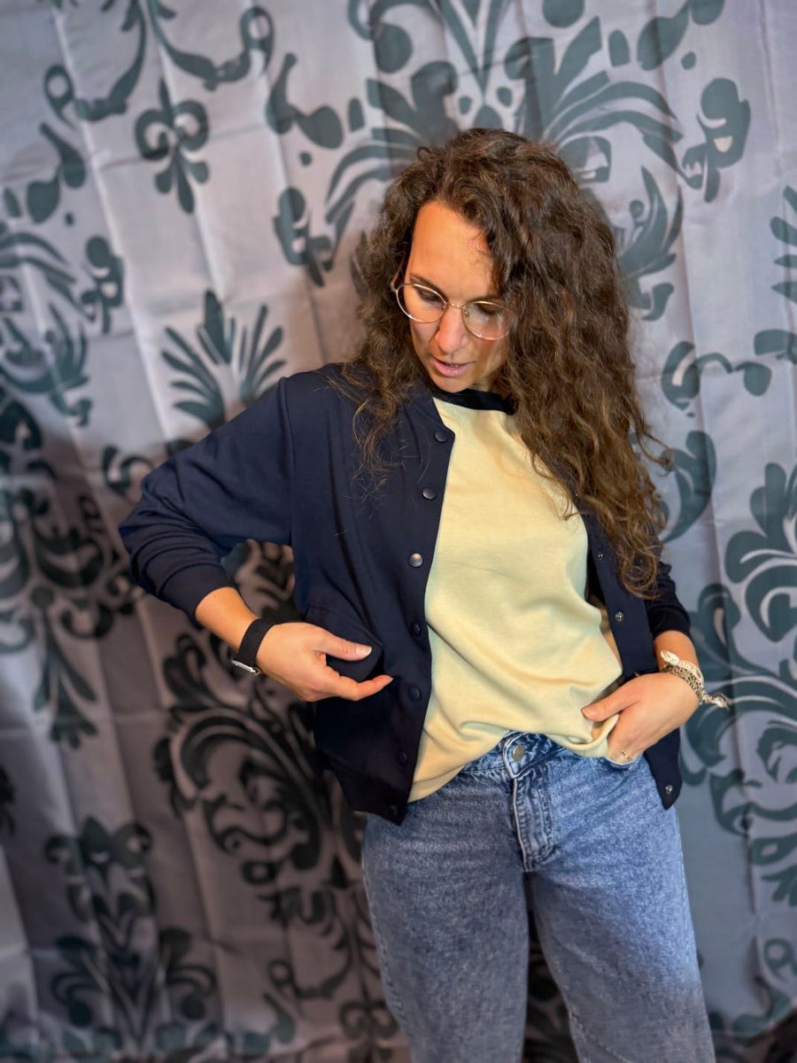 Bluse mit Rippenbündchen in Creme