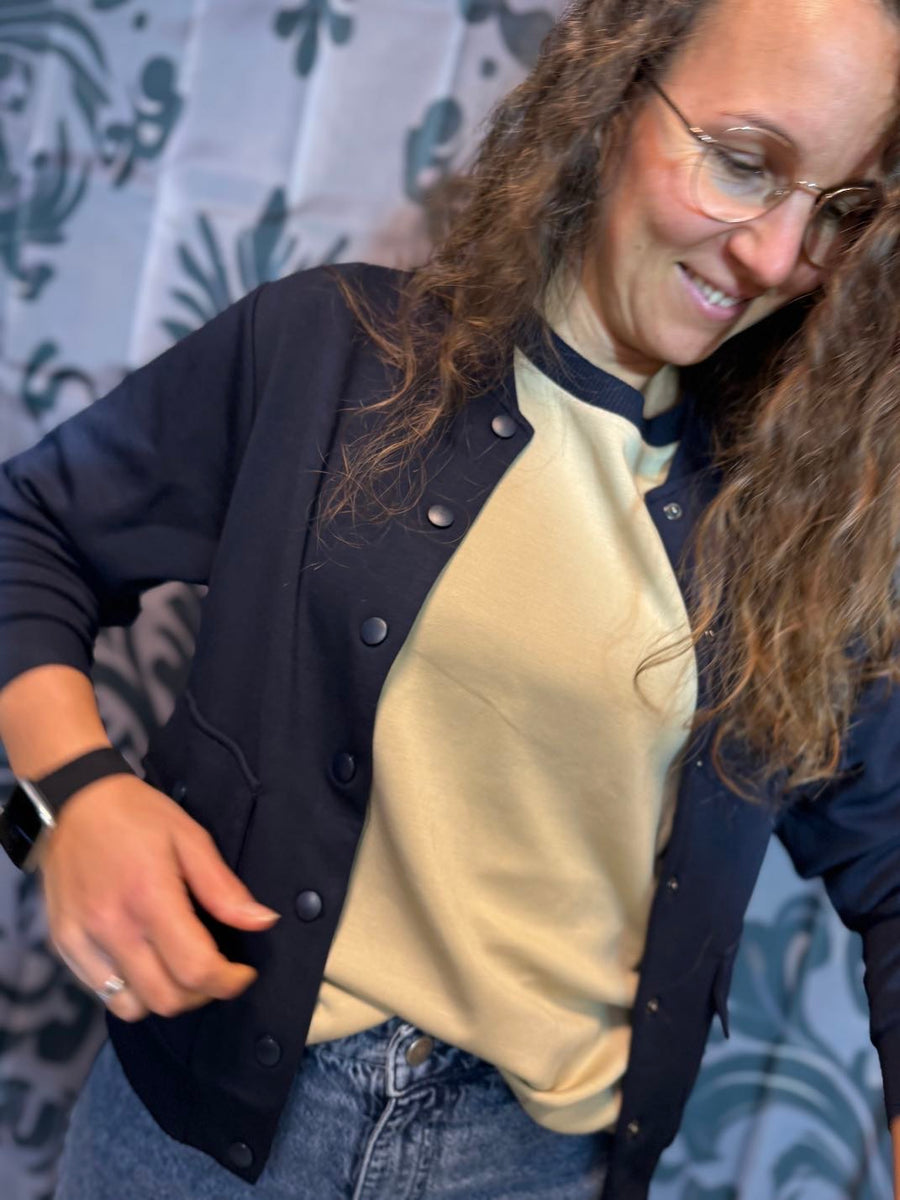 Bluse mit Rippenbündchen in Creme