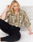 Plus Size Bluse mit V-Ausschnitt und abstraktem Print